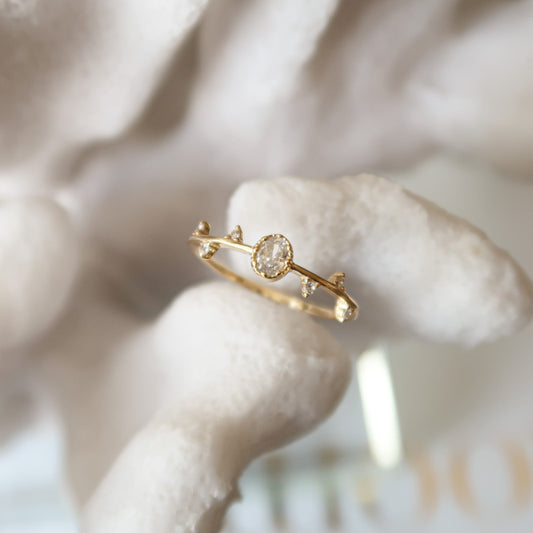 Vine Engagement Ring modeled on faux coral decoration, showcasing its elegant design and cubic zirconia sparkl