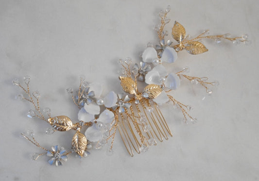 Elegant floral gold hair pin with rhinestones and faux pearls displayed front view on a white background.