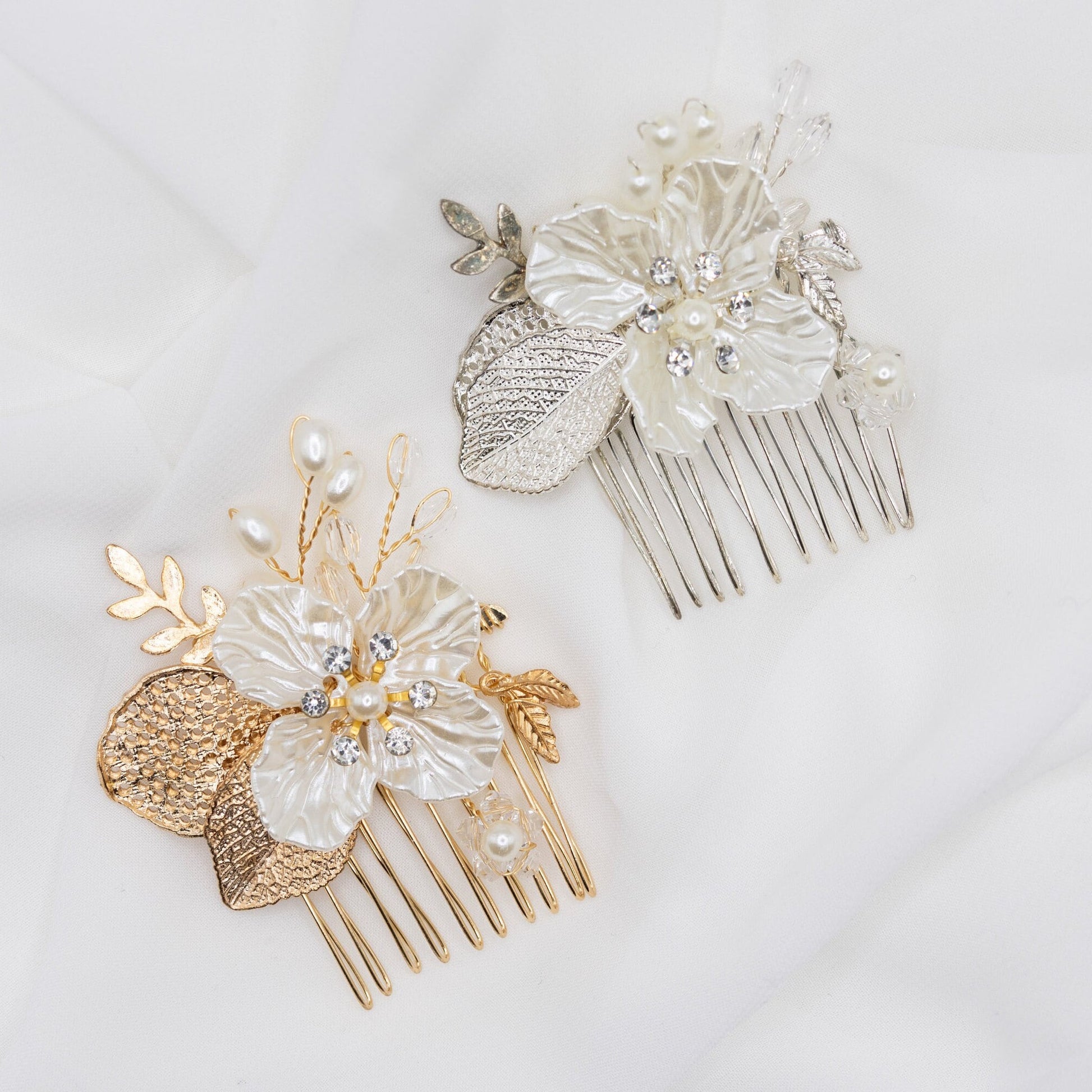 Elegant floral hair pins in gold and silver variations, showcasing rhinestone embellishments on a white background.