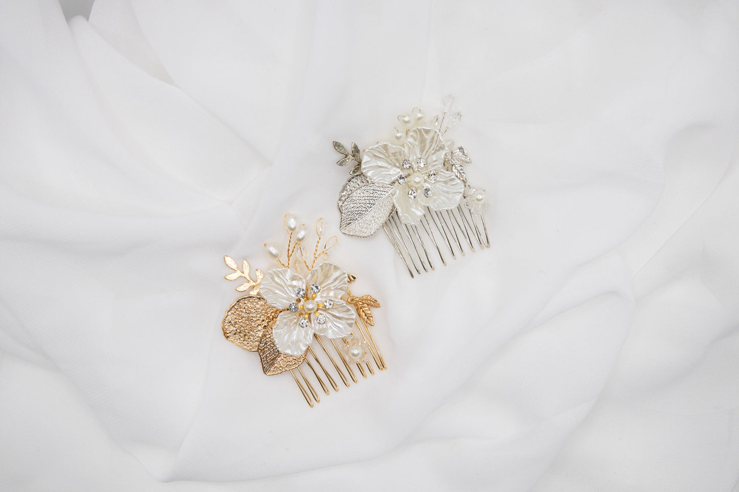 Bridal hair accessories featuring gold and silver floral hair pins with faux pearls, elegantly arranged against a white background